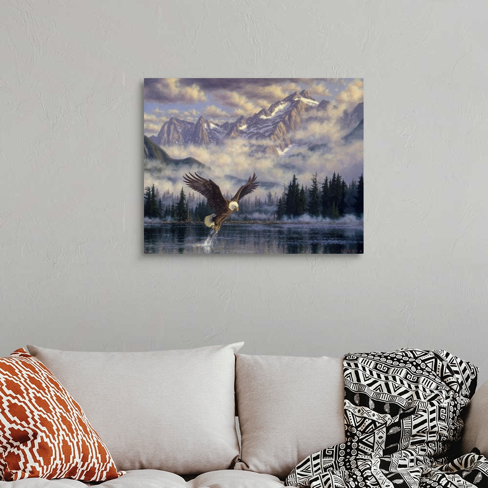 A bohemian room featuring Eagle seizing a fish from the water with mountains in the distance.