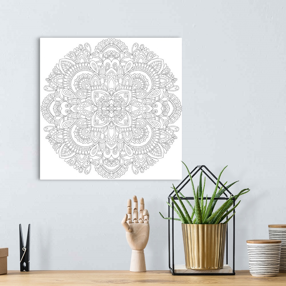 A bohemian room featuring Black and white line art of an intricately designed mandala, great for a coloring canvas.