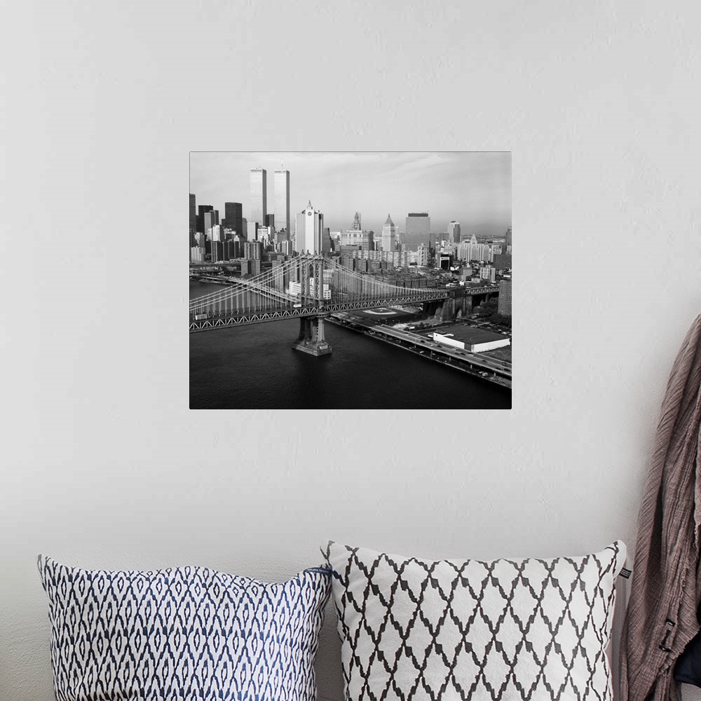 A bohemian room featuring Manhattan Bridge with Twin Towers behind