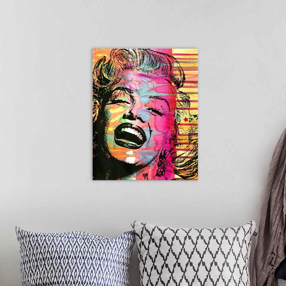 A bohemian room featuring Colorful illustration of Marilyn Monroe laughing with busy painted designs in the background.