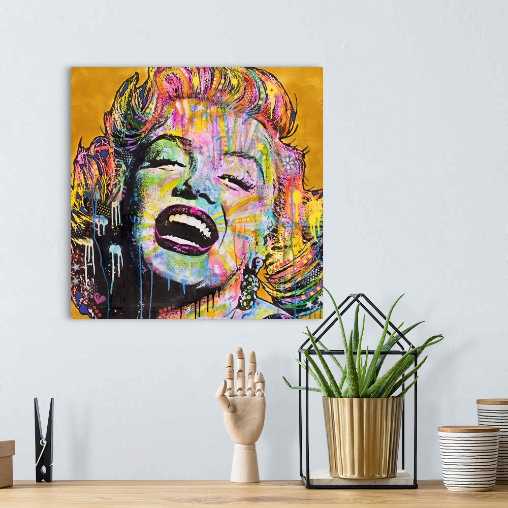 A bohemian room featuring Square illustration of Marilyn Monroe laughing and full of color with paint drips running down to...