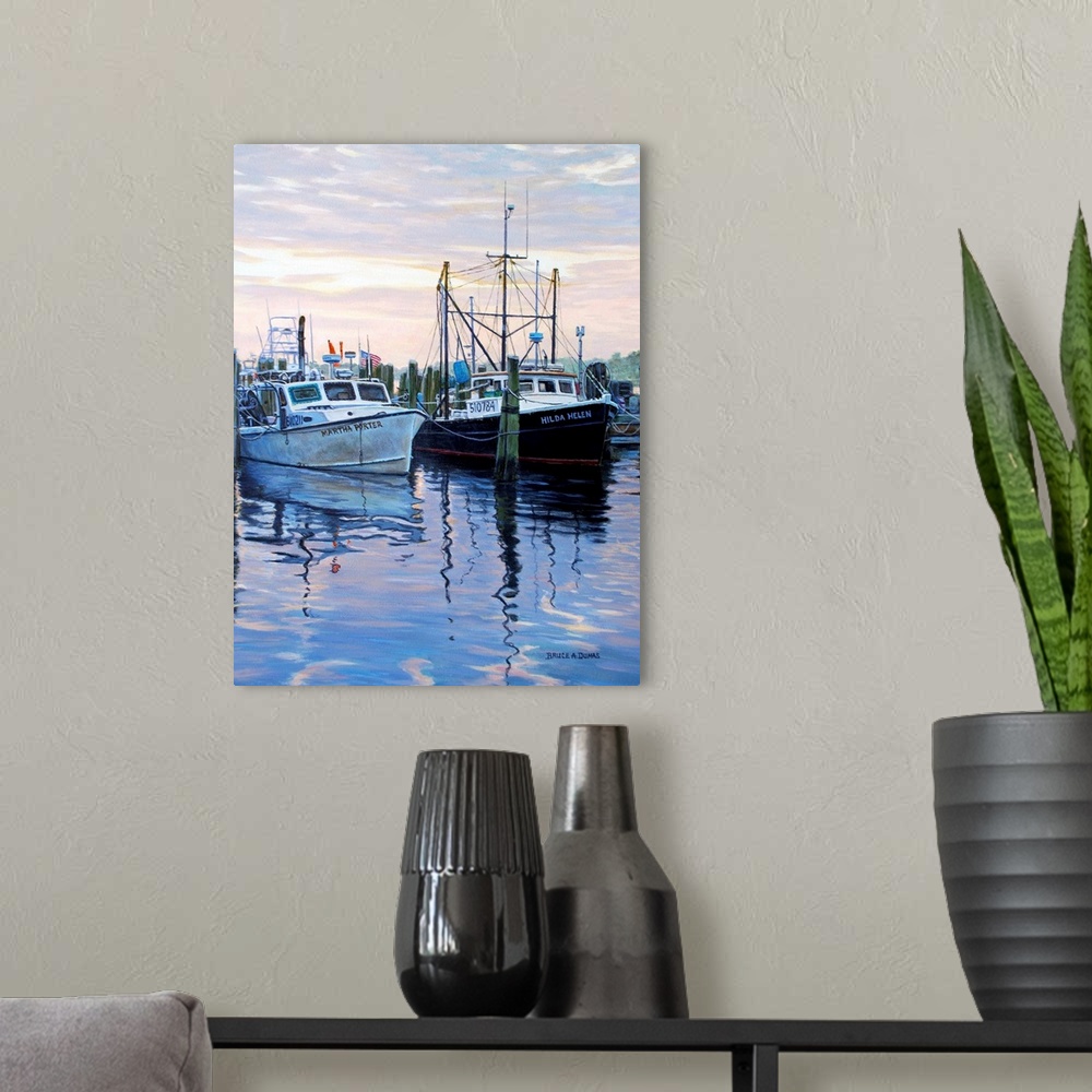 A modern room featuring Contemporary painting of two large boats docked to wooden pillars in the water in the early evening.