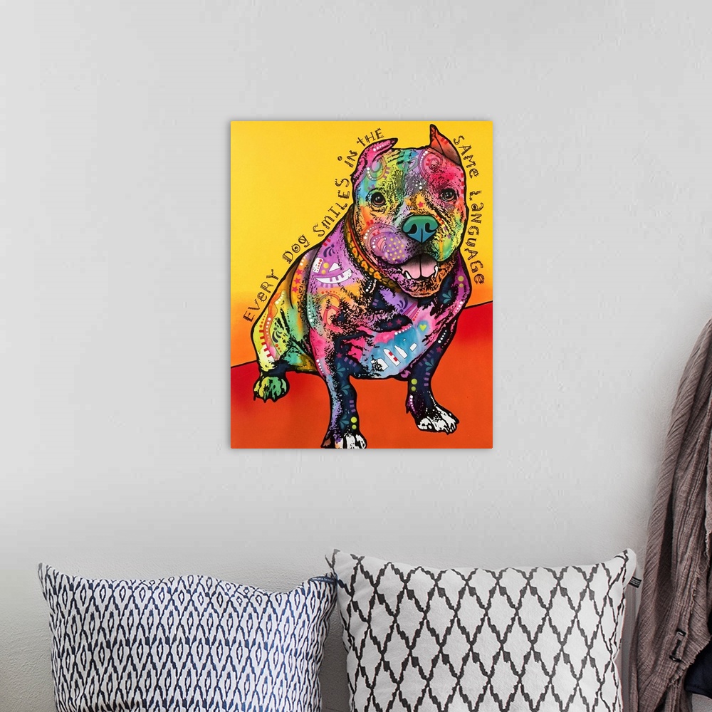 A bohemian room featuring "Every Dog Smiles in the Same Language" handwritten around a colorfully painted pit bull on a yel...