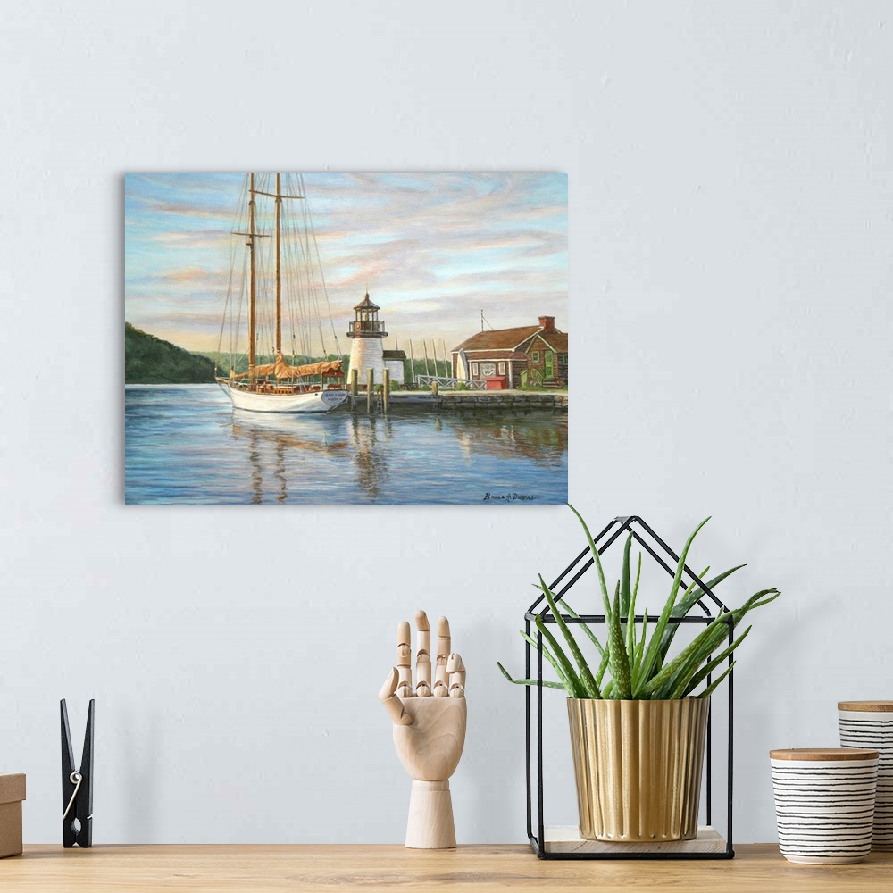 A bohemian room featuring Contemporary artwork of a small lighthouse at a harbor with ships.