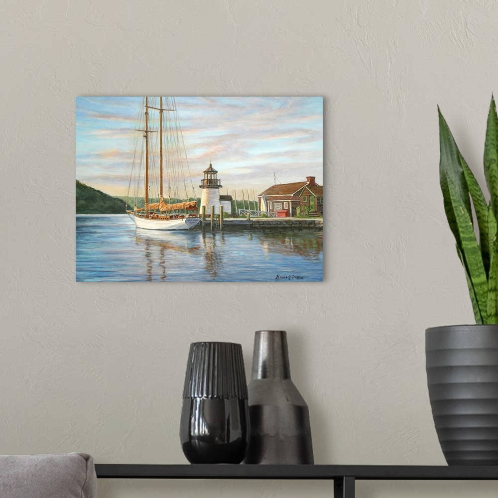 A modern room featuring Contemporary artwork of a small lighthouse at a harbor with ships.