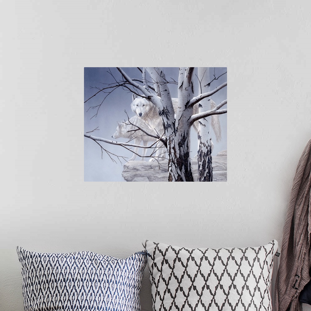 A bohemian room featuring Two white wolves standing on a ledge behind birch trees in heavy fog.