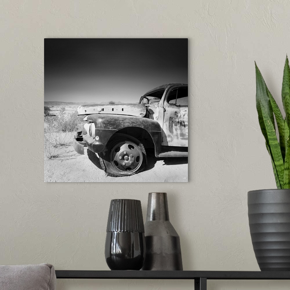 A modern room featuring Namibia Rotten Car, black and white photography