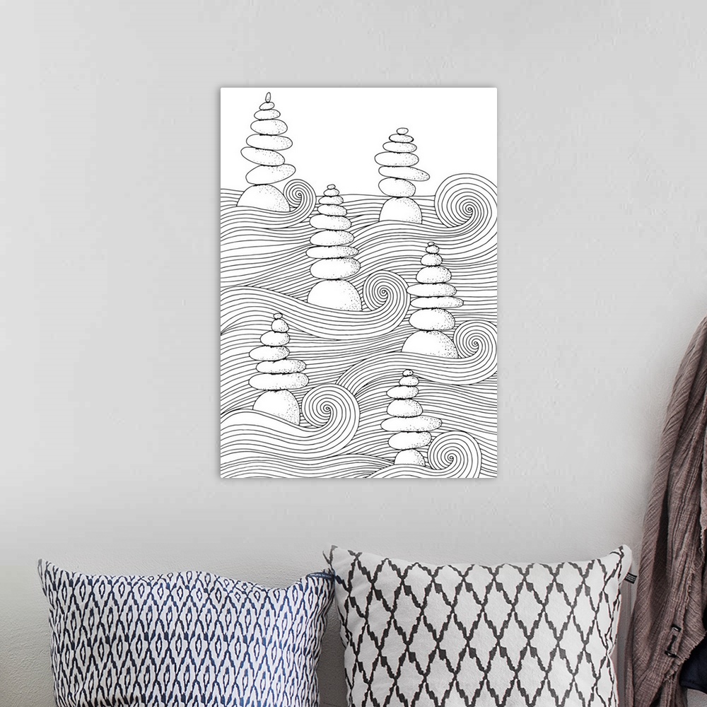 A bohemian room featuring Black and white line art of stacked rocks in moving, swirly waves.