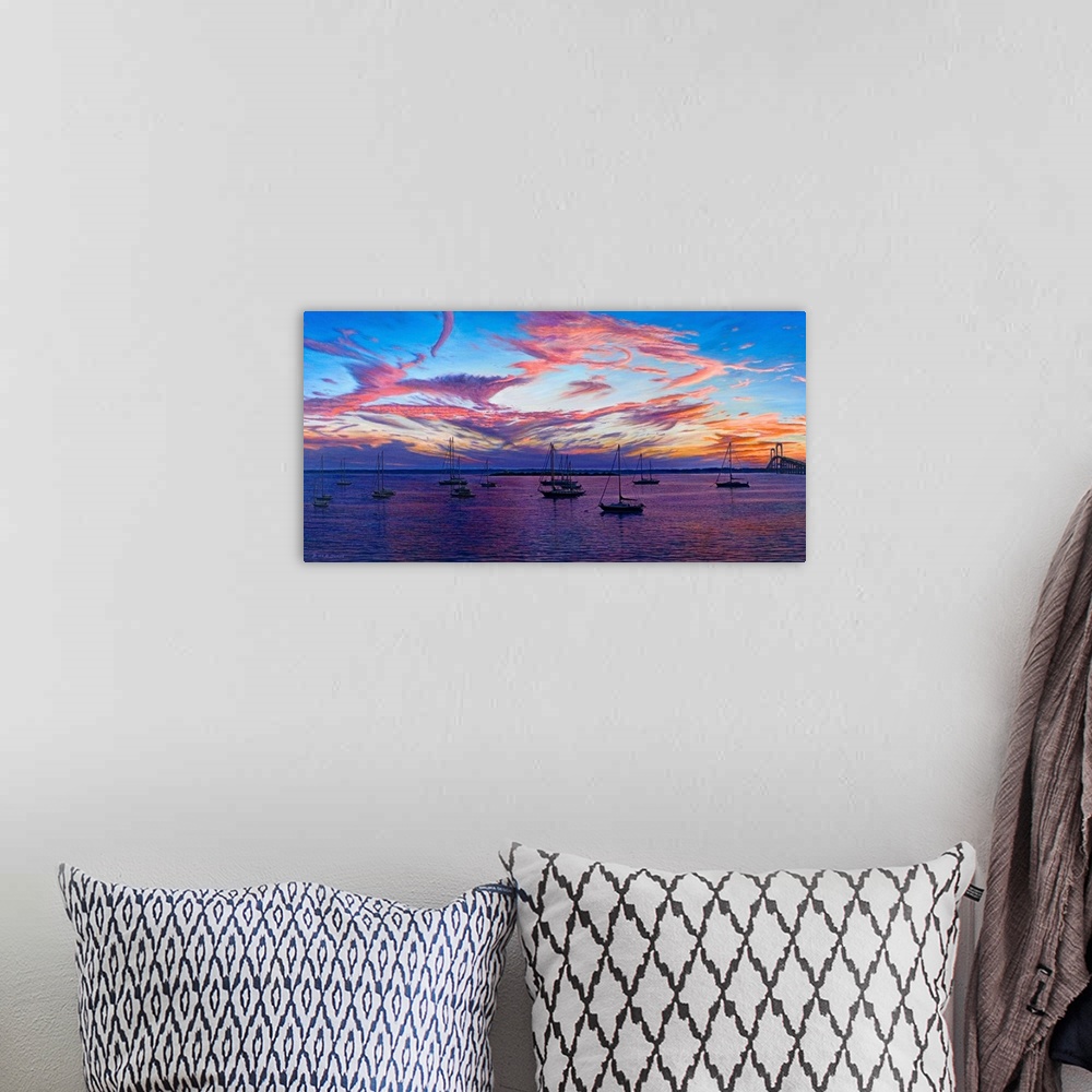 A bohemian room featuring Contemporary artwork of boats in harbor overlooking the sunset.