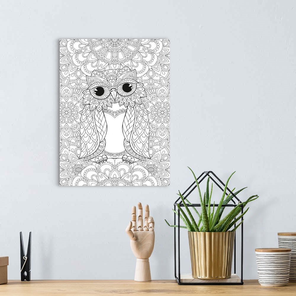 A bohemian room featuring Black and white line art of a decorative owl on a busy, intricately designed background.