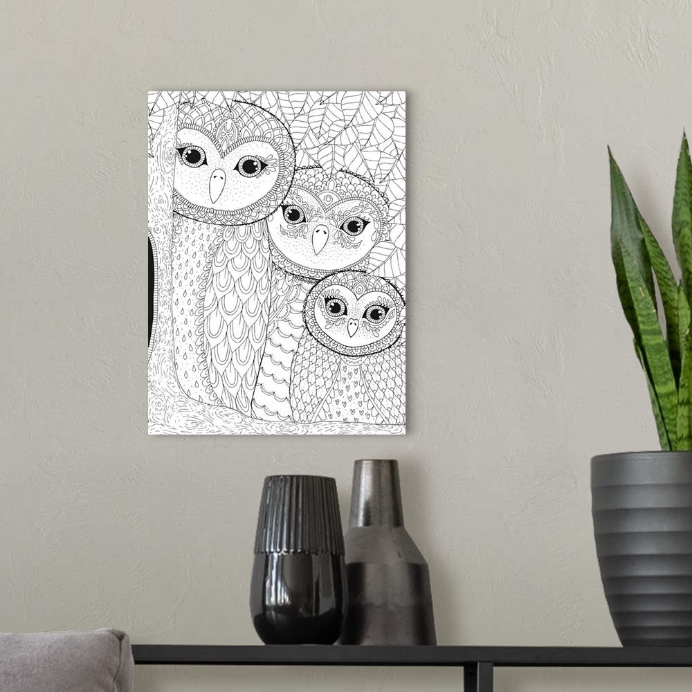A modern room featuring Black and white line art of a family of owls in a tree with a leafy background.
