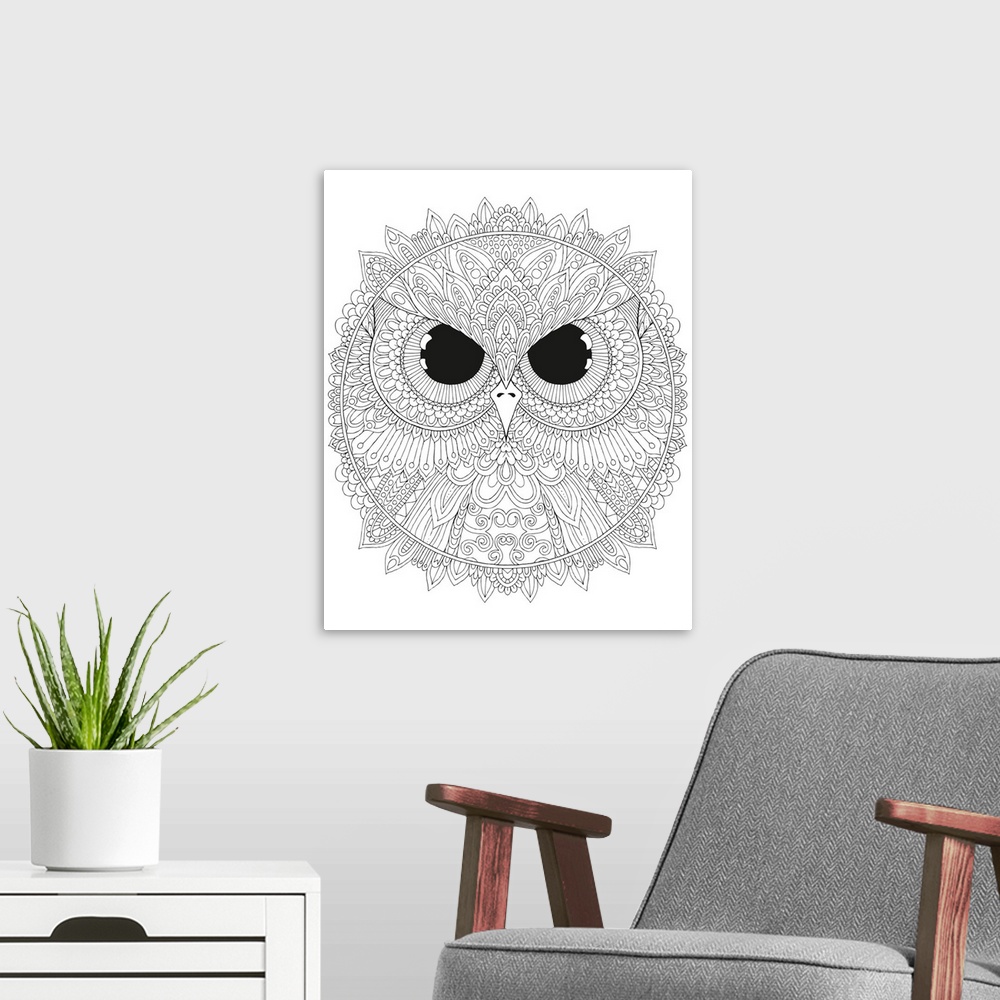 A modern room featuring Black and white line art of a circular design with a close-up of an owl's face with big, black, f...