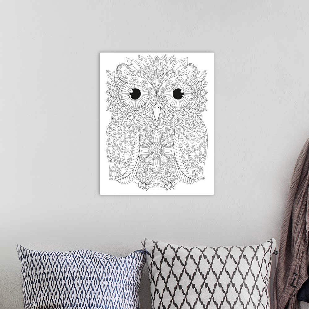 A bohemian room featuring Black and white line art of an intricately designed owl.
