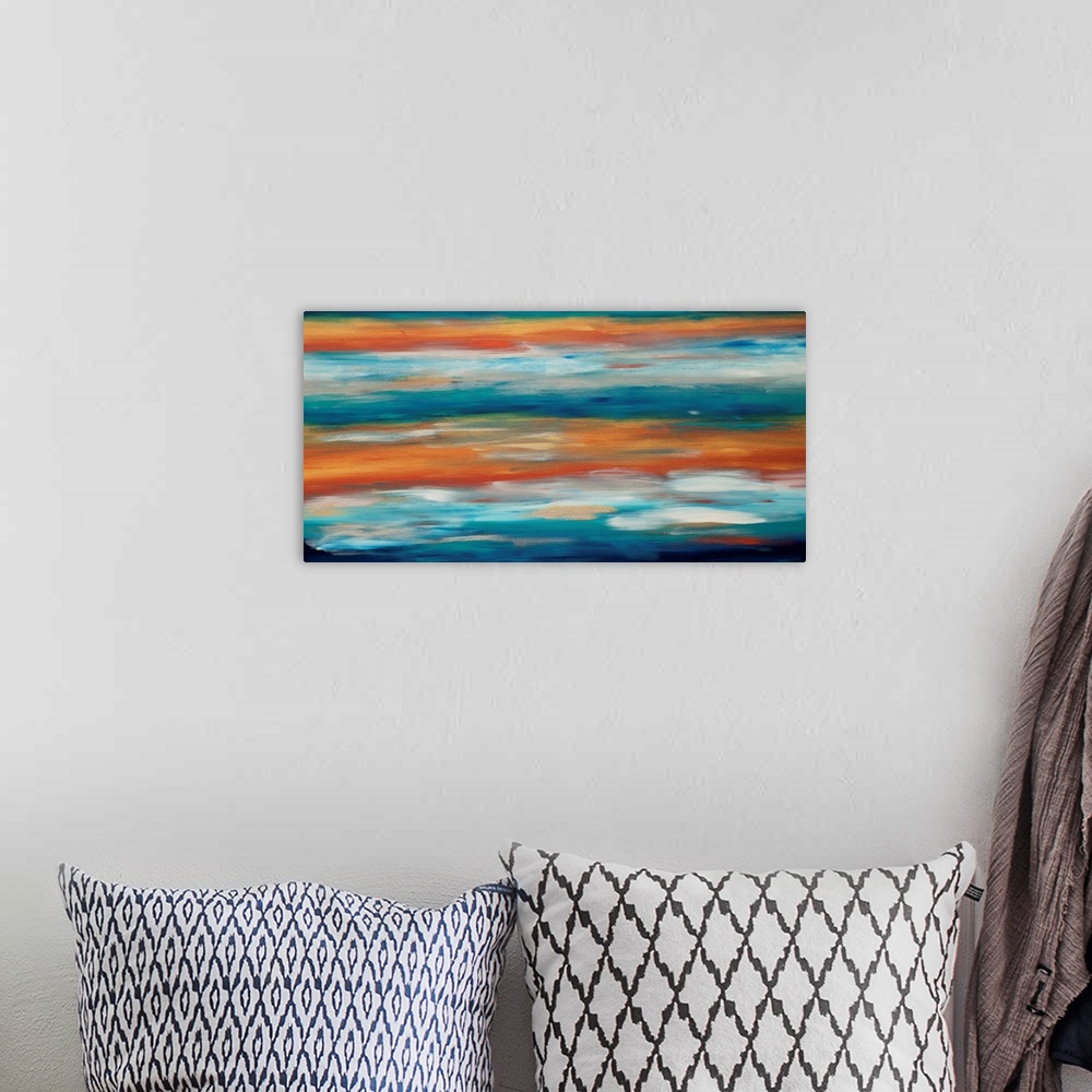 A bohemian room featuring Contemporary abstract painting in blue and orange, resembling the evening sky.