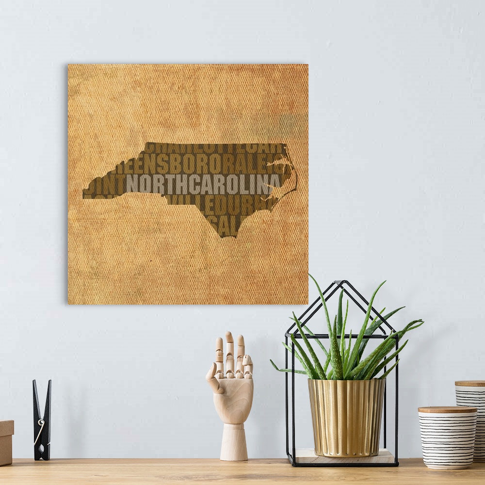A bohemian room featuring Contemporary typography art map of the state outline of North Carolina.