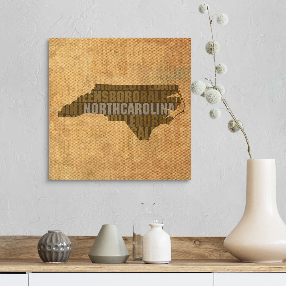A farmhouse room featuring Contemporary typography art map of the state outline of North Carolina.