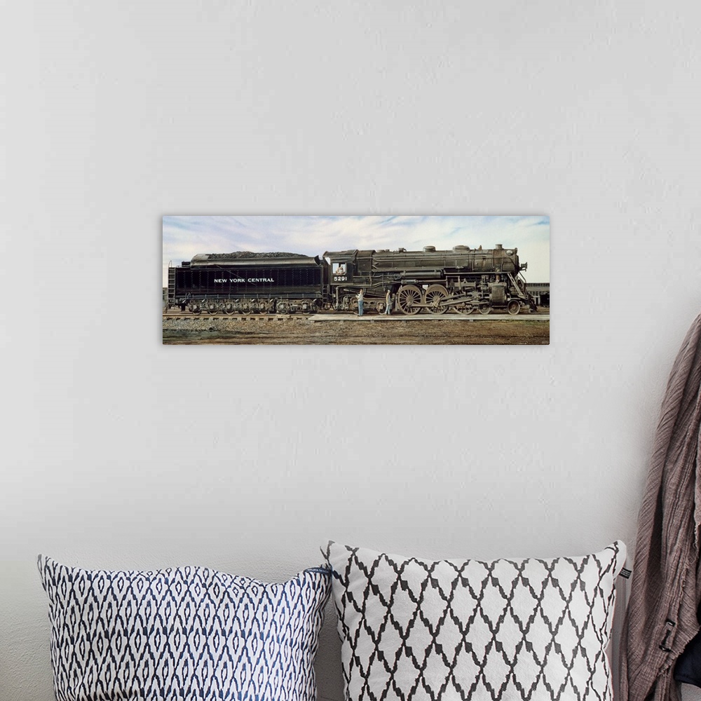 A bohemian room featuring Contemporary painting of a train engine fueling and getting ready to move out.