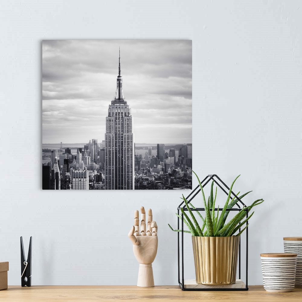 A bohemian room featuring NYC Empire state building, black and white photographyNew York