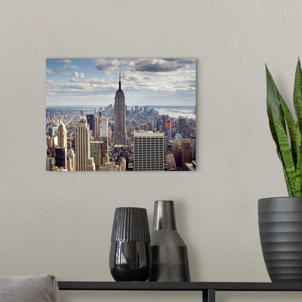 A modern room featuring NYC The Empire state building
