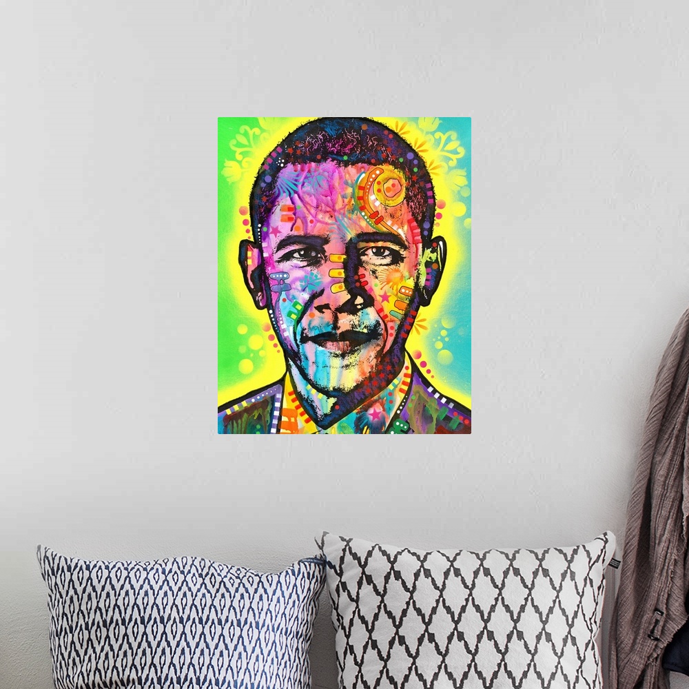 A bohemian room featuring Pop art style painting of Barack Obama with different colors and abstract designs all over.