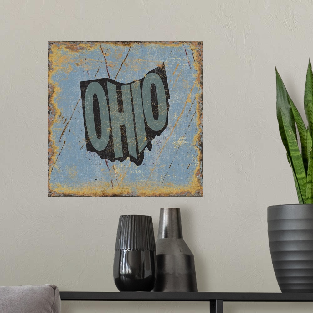 A modern room featuring Contemporary typography art of a state outline against a grungy distressed background.