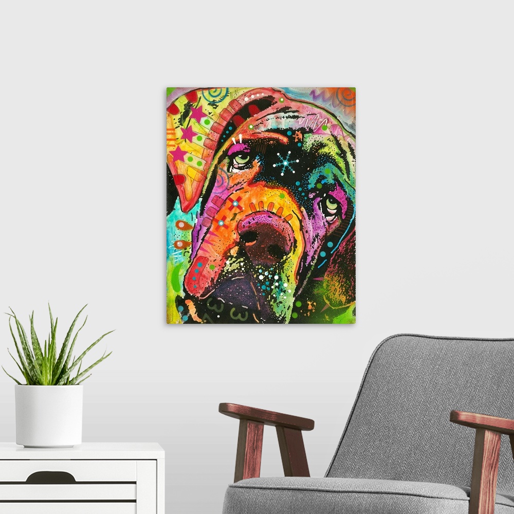 A modern room featuring Vibrant painting of droopy faced dog with colorful abstract designs all over.