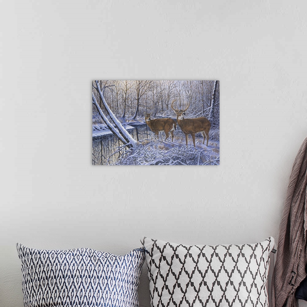 A bohemian room featuring Contemporary artwork of two white tail deer about to drink from stream in wintery forest but turn...