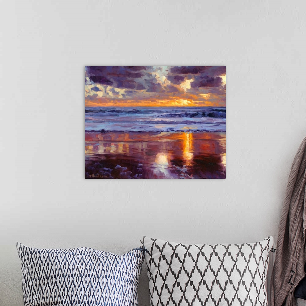 A bohemian room featuring Abstract painting of a beach with crashing waves and a setting sun in the distance made up of big...