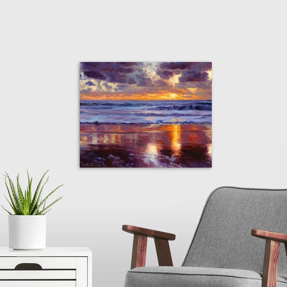 A modern room featuring Abstract painting of a beach with crashing waves and a setting sun in the distance made up of big...
