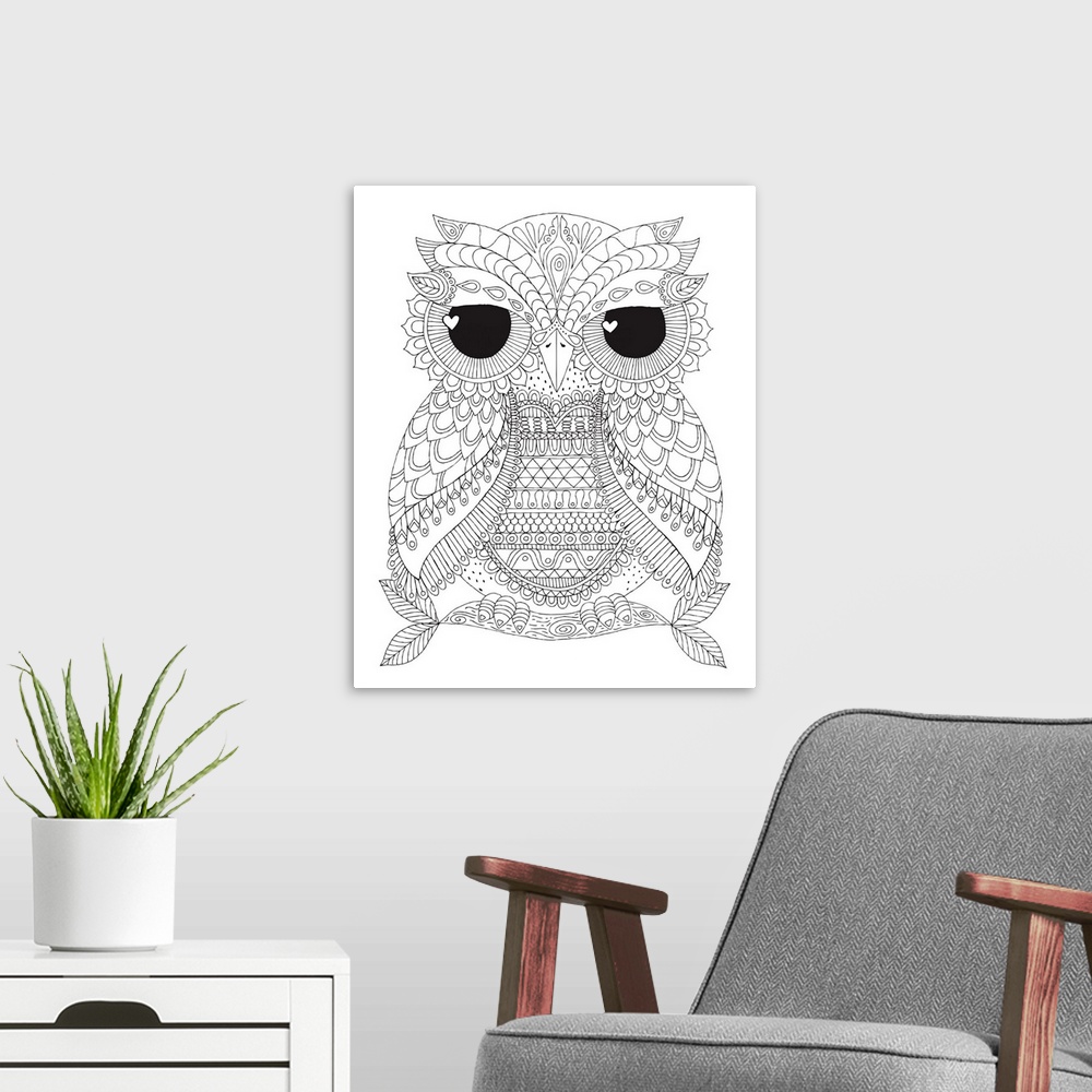 A modern room featuring Black and white line art of an owl with unique markings and big black eyes with heart shaped pupils.