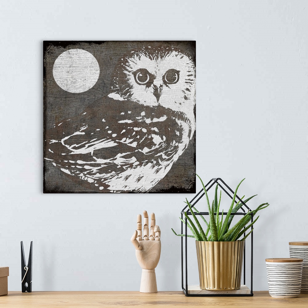A bohemian room featuring Stylized woodcut of owl and moon