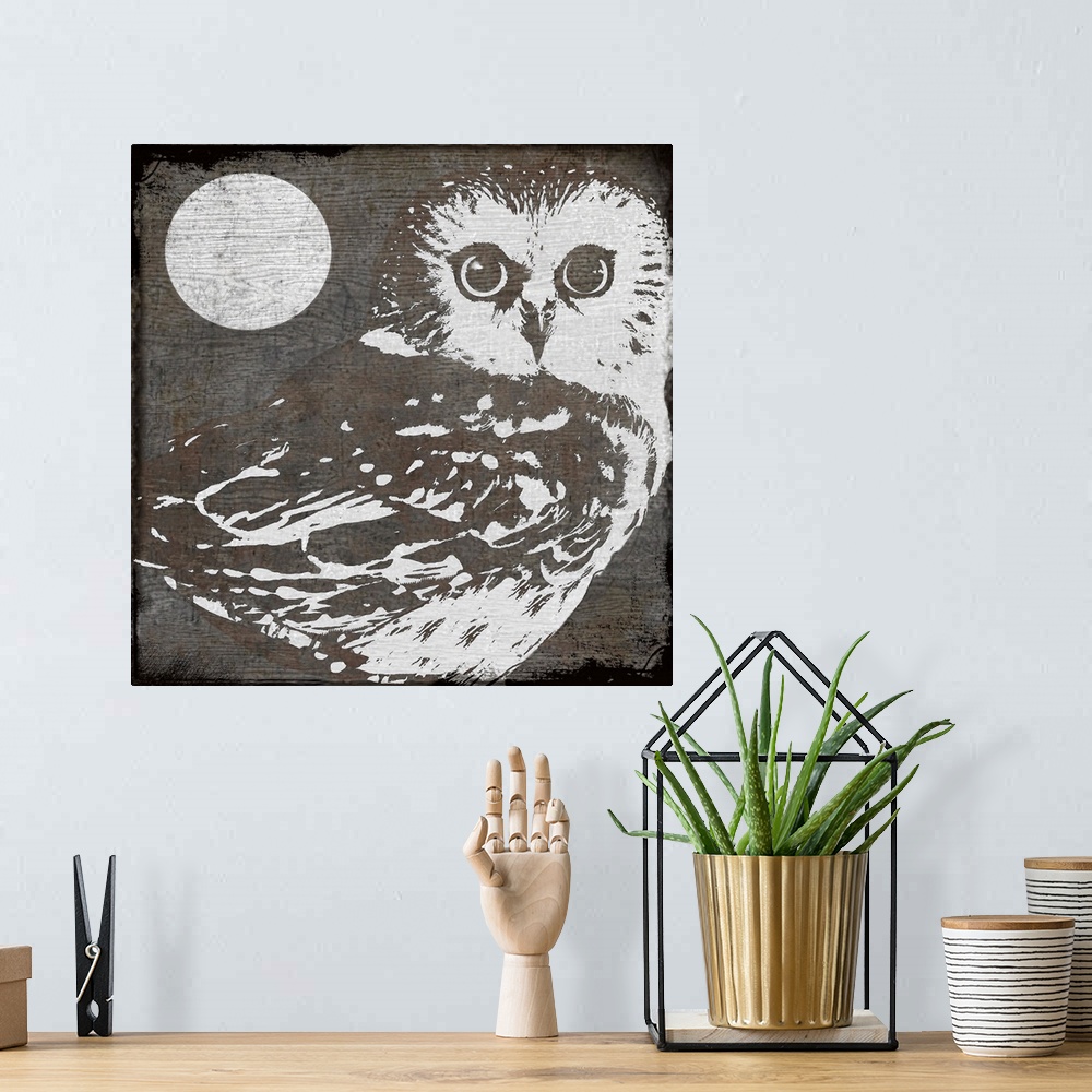 A bohemian room featuring Stylized woodcut of owl and moon