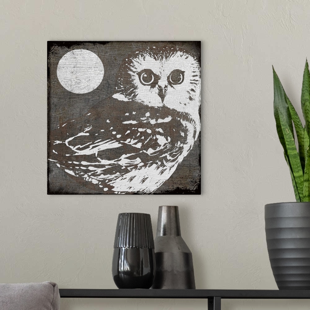 A modern room featuring Stylized woodcut of owl and moon