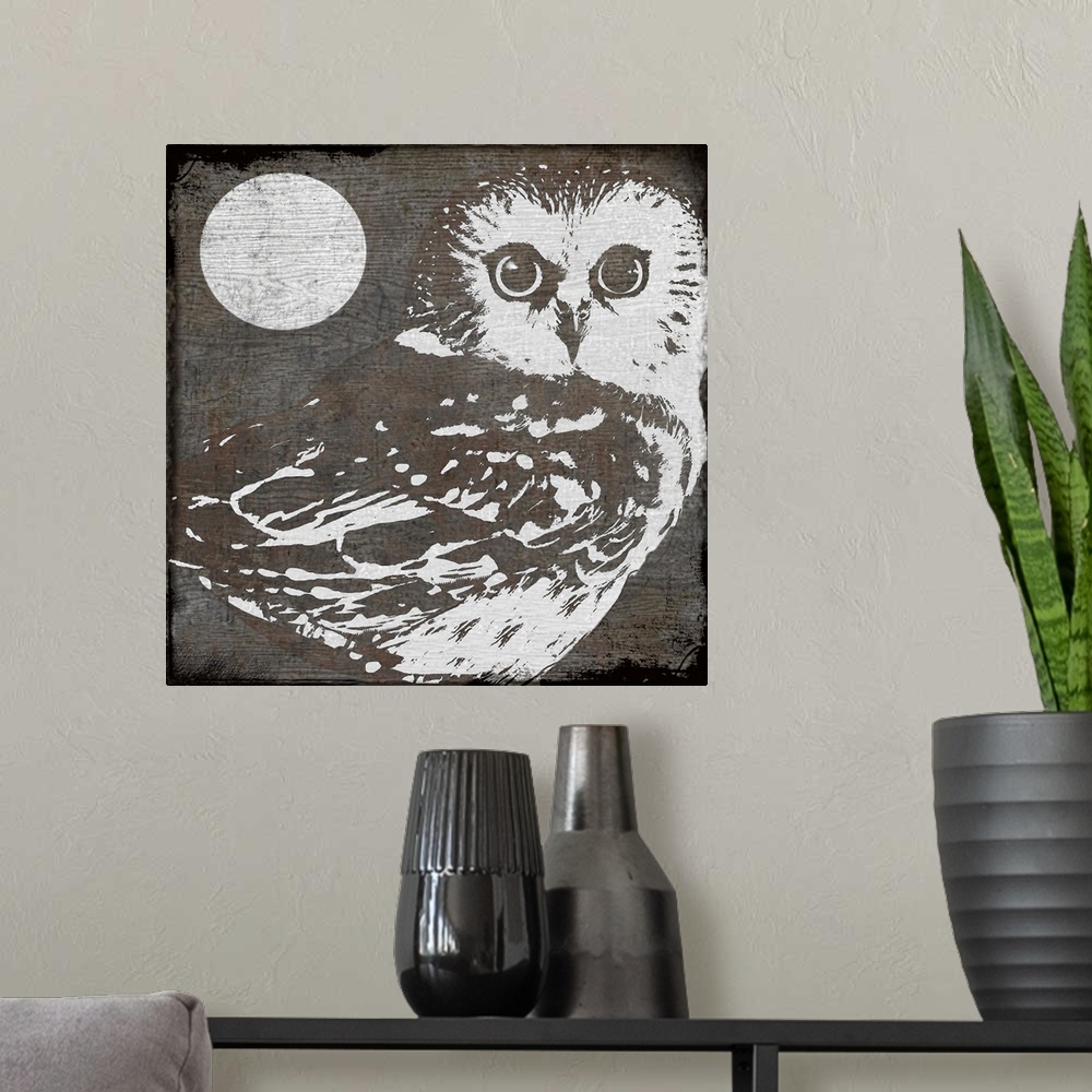 A modern room featuring Stylized woodcut of owl and moon