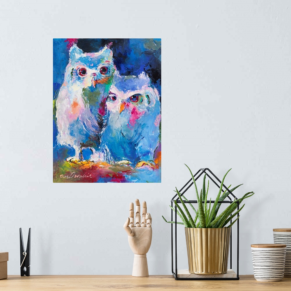 A bohemian room featuring Colorful abstract painting of two owls.