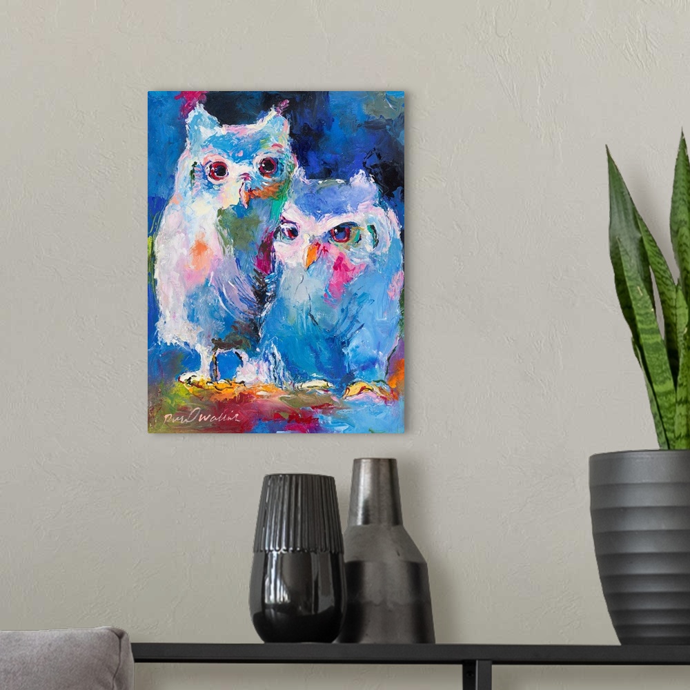 A modern room featuring Colorful abstract painting of two owls.