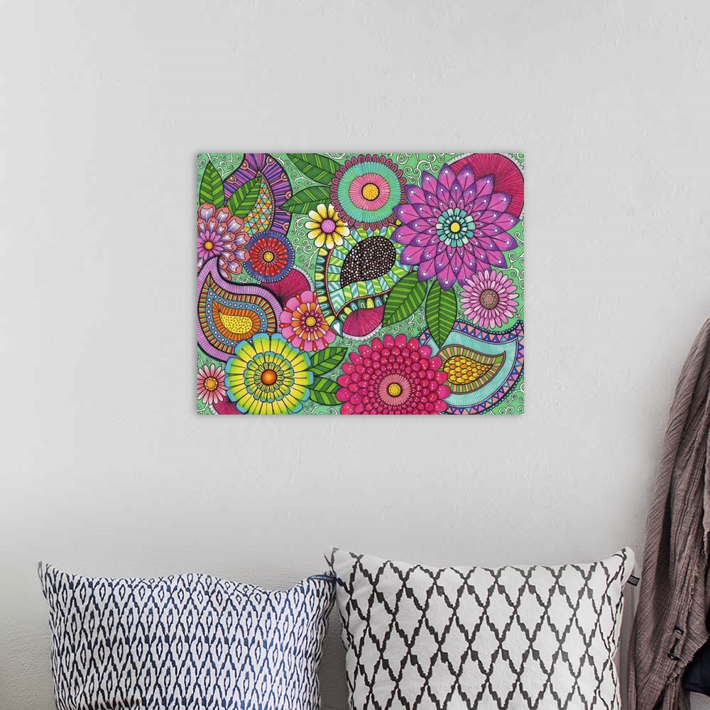 A bohemian room featuring Contemporary abstract artwork of flowers using bright vibrant colors and patterns.