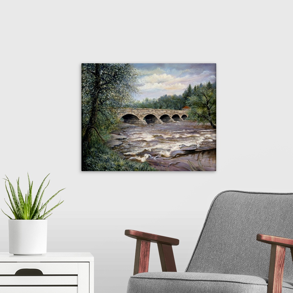 A modern room featuring Contemporary artwork of a bridge with five masonry arches.