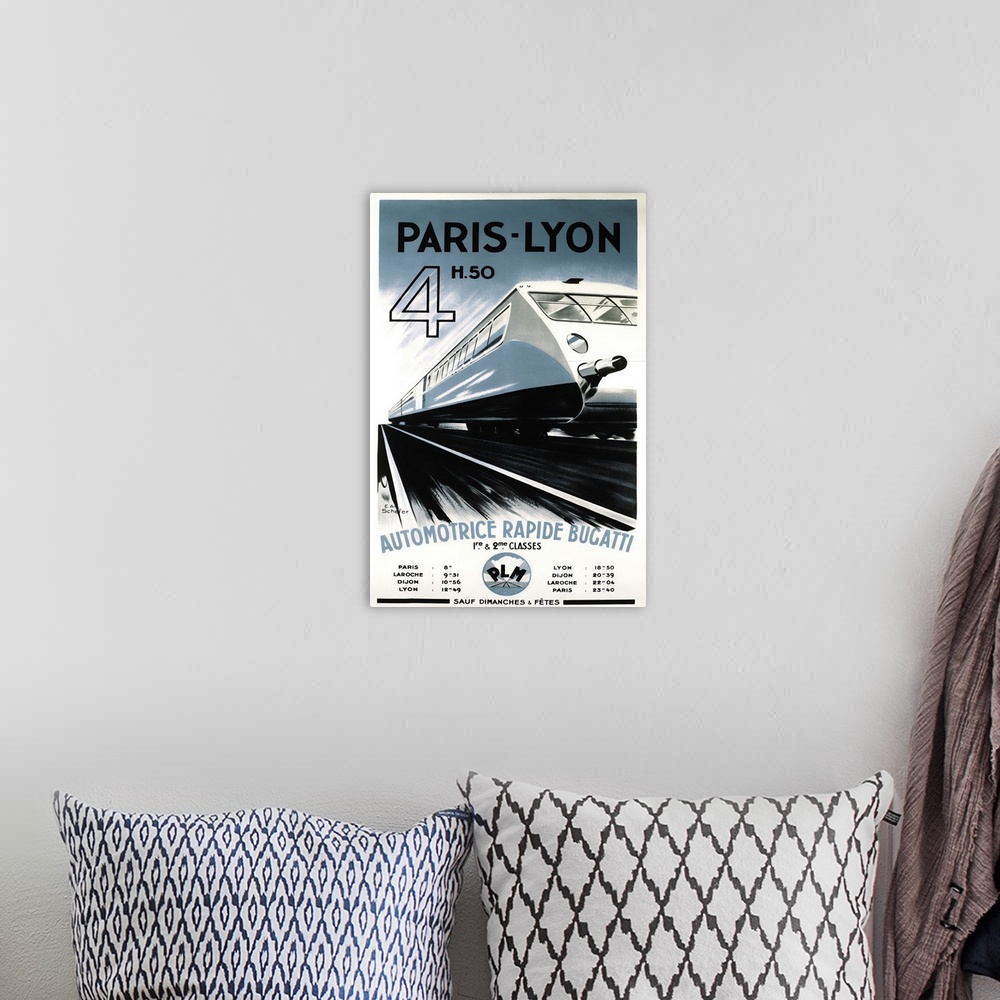 A bohemian room featuring Vintage travel advertisement for rail travel via Paris-Lyon.
