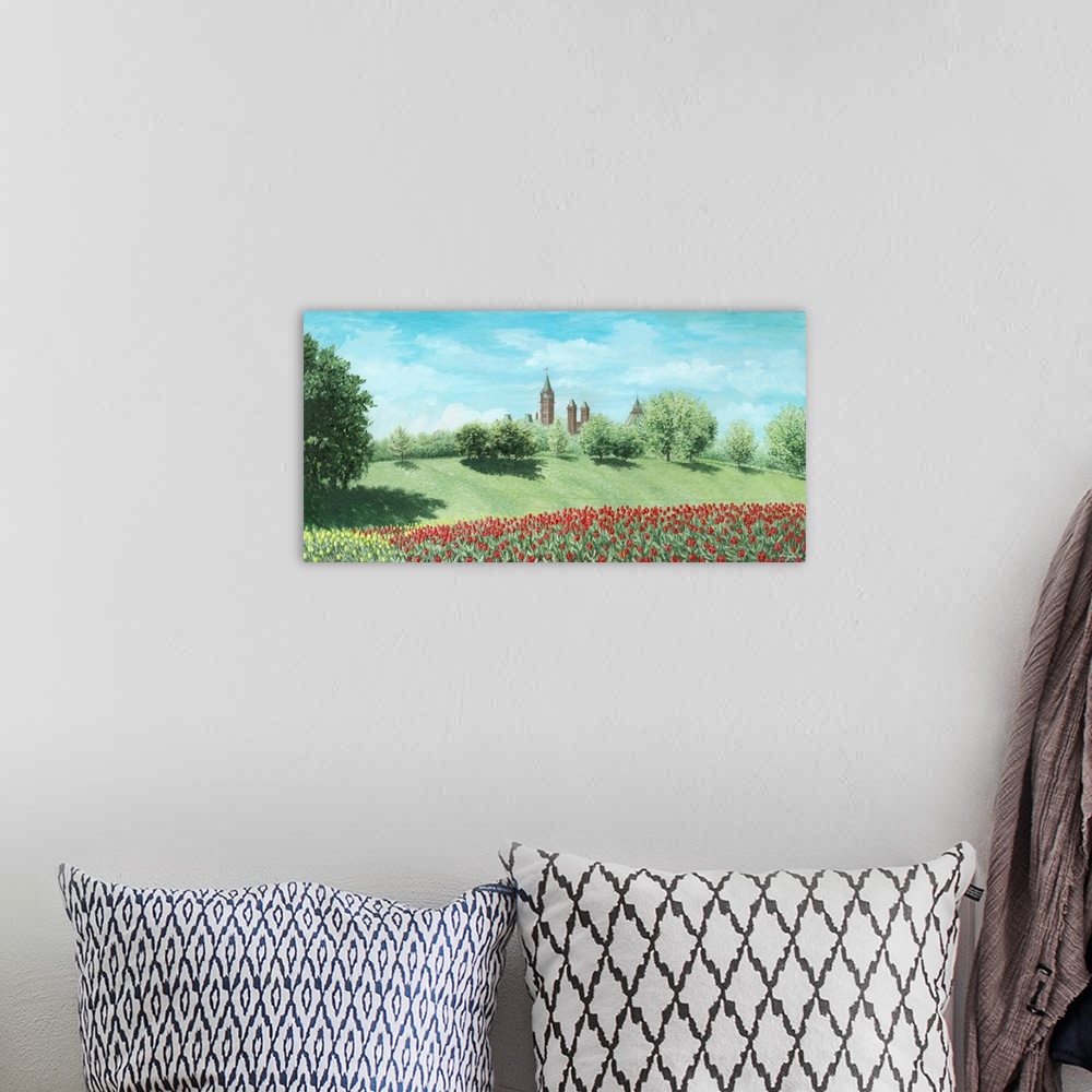 A bohemian room featuring Contemporary artwork of a field of tulips with buildings in the distance.