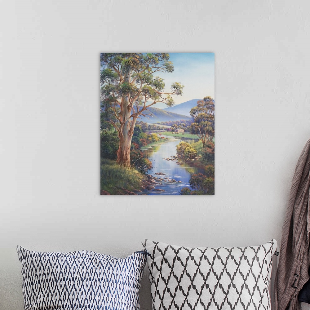 A bohemian room featuring Contemporary painting of a mountainous valley.