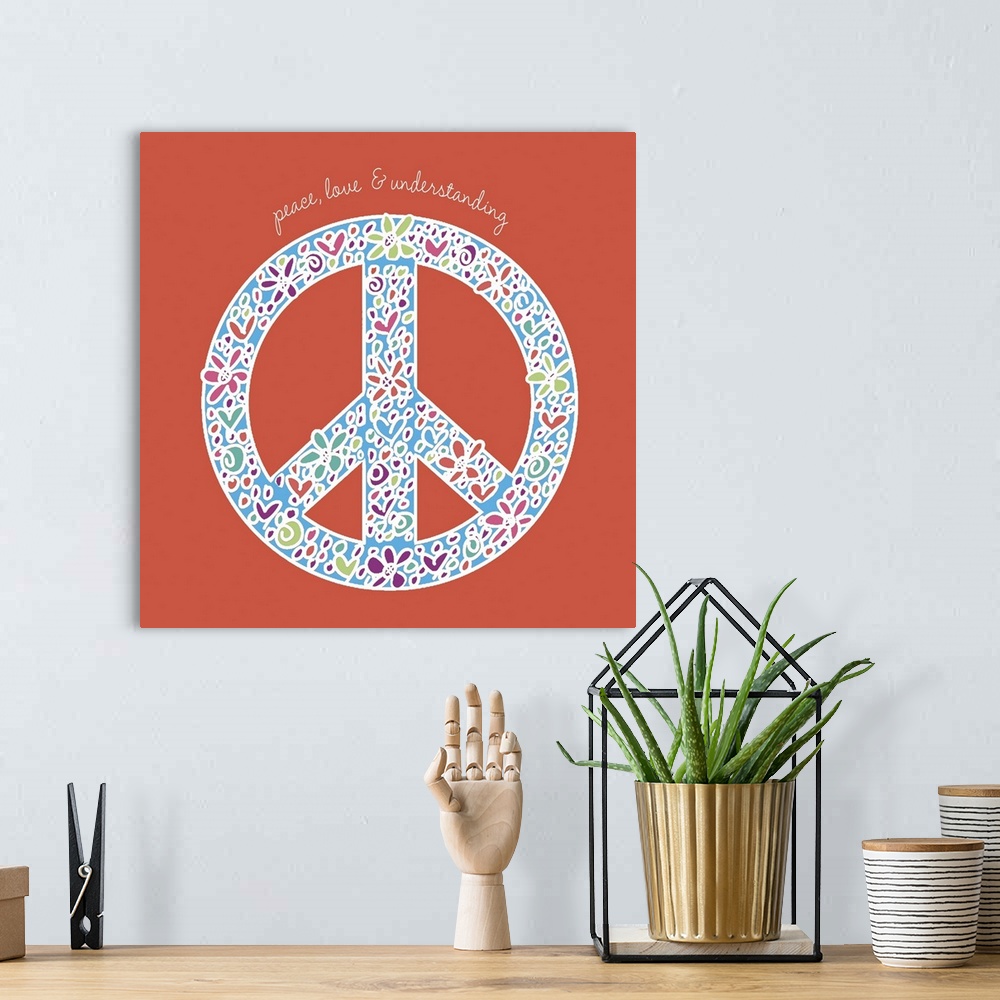 A bohemian room featuring Decorative image of a peace sign with flowers and the phrase "Give Peace A Chance."