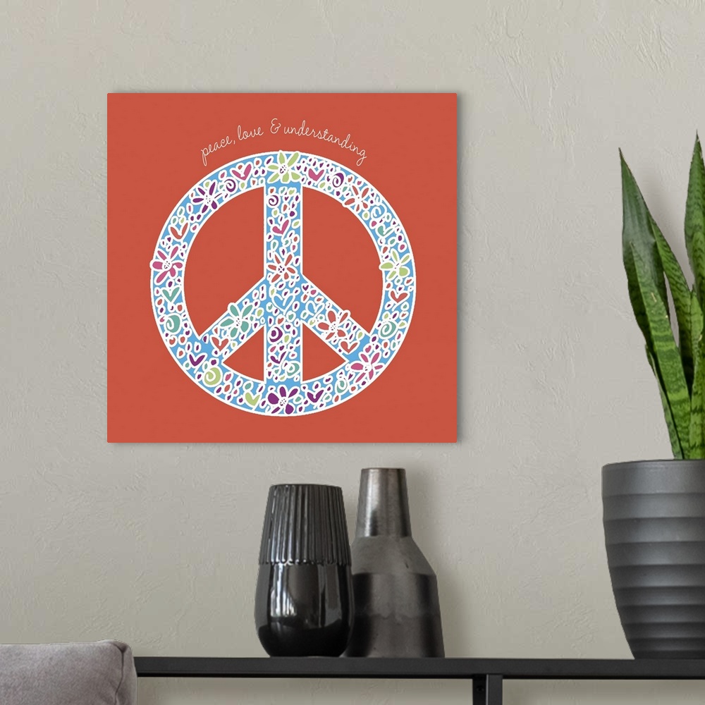A modern room featuring Decorative image of a peace sign with flowers and the phrase "Give Peace A Chance."