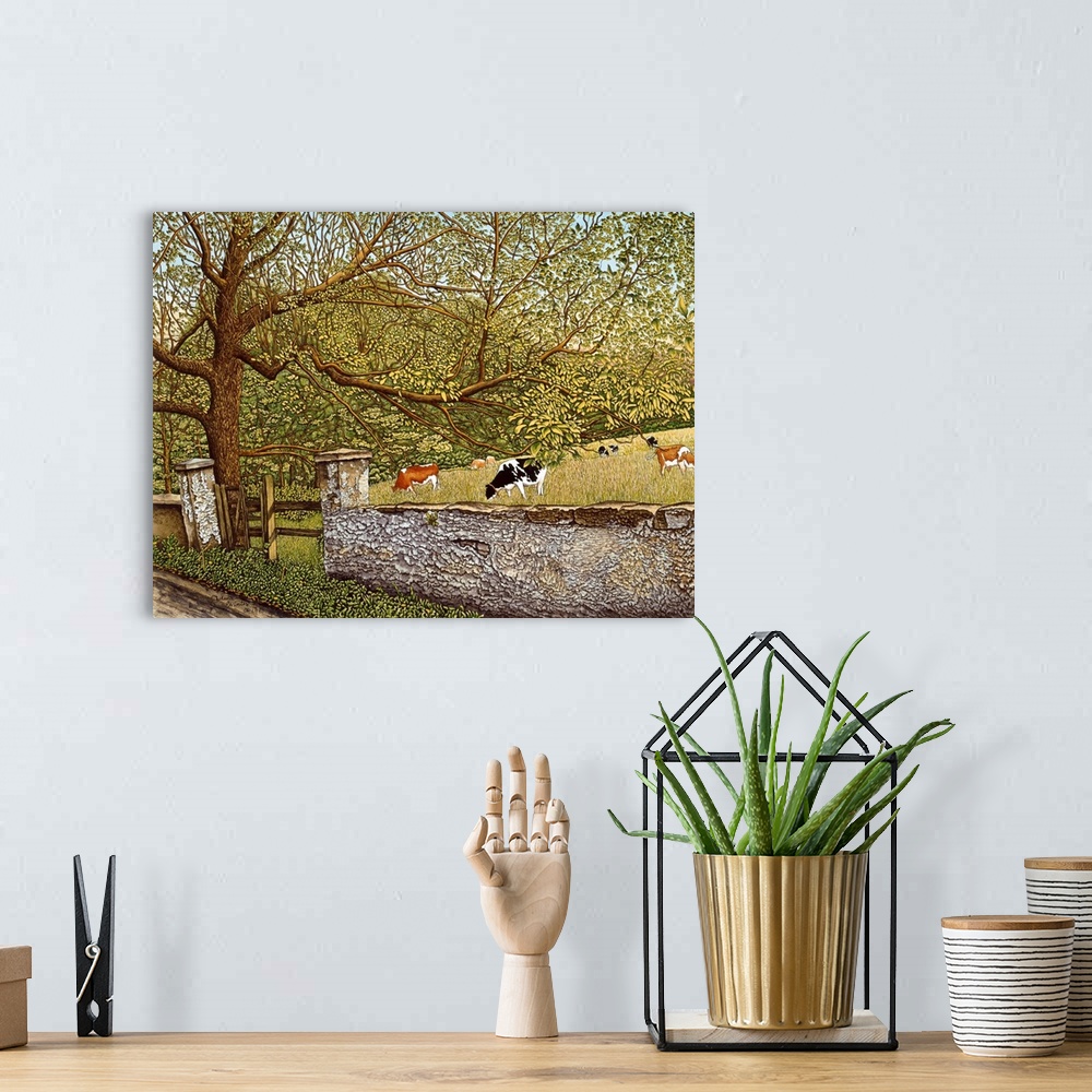 A bohemian room featuring Contemporary artwork of a serene countryside scene.