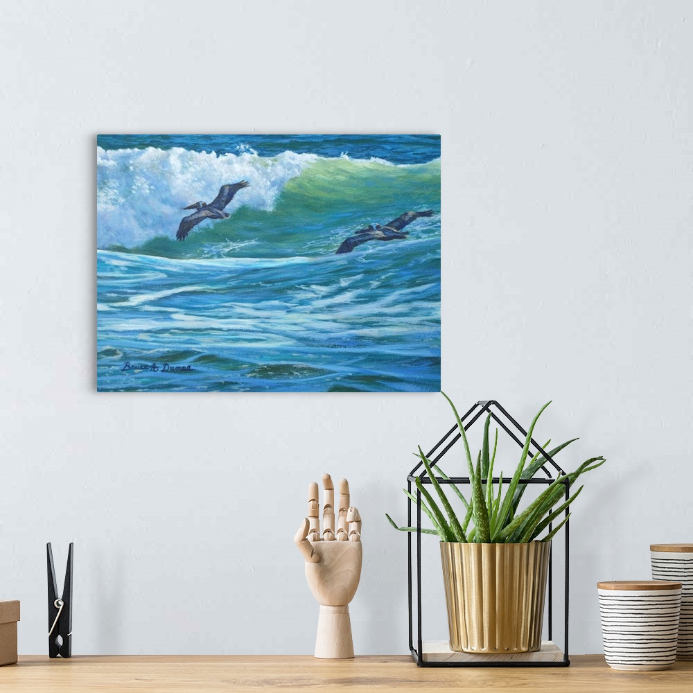 A bohemian room featuring Contemporary painting of two pelicans soaring over a wave about to crash in the ocean.