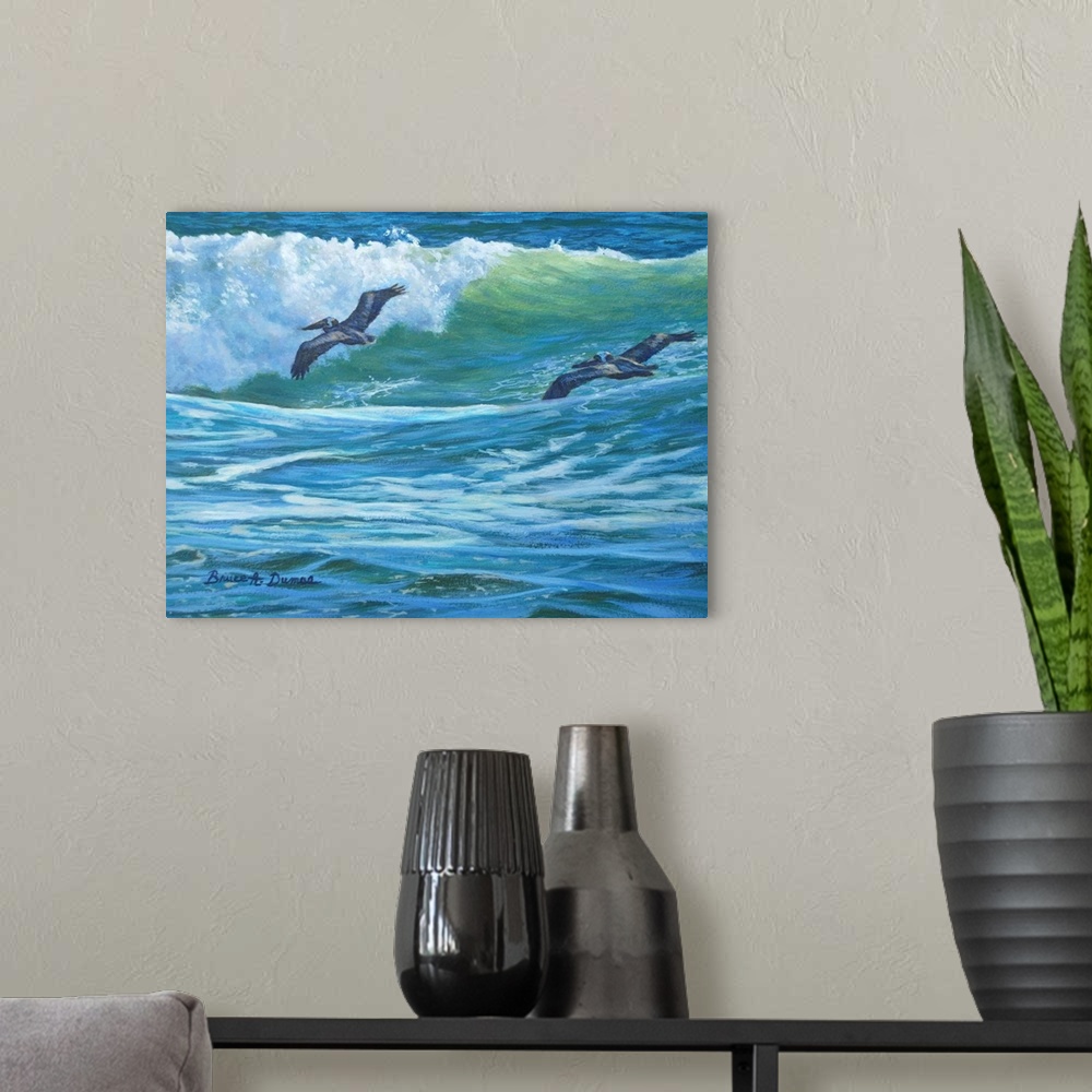 A modern room featuring Contemporary painting of two pelicans soaring over a wave about to crash in the ocean.