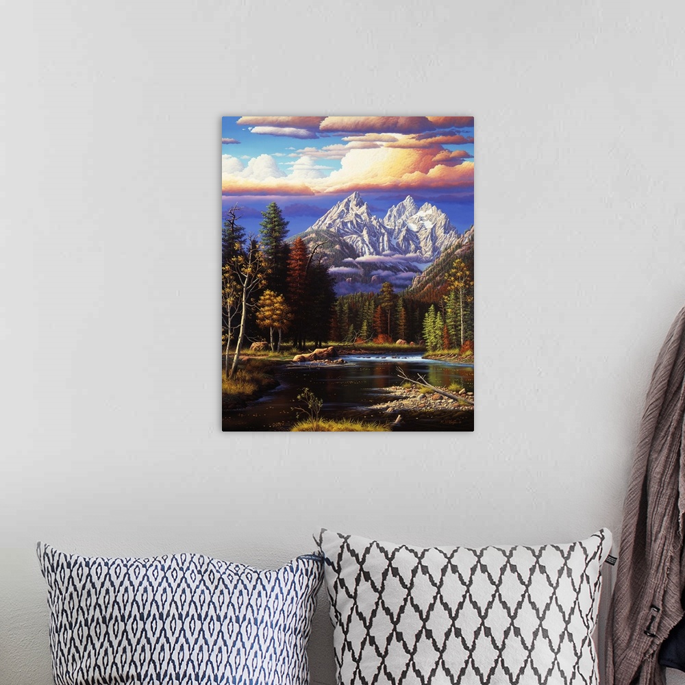 A bohemian room featuring River landscape with tall mountains and glowing clouds.