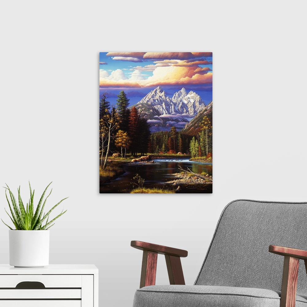 A modern room featuring River landscape with tall mountains and glowing clouds.