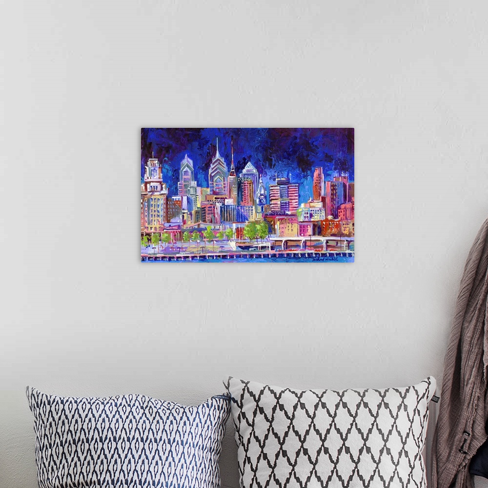 A bohemian room featuring Contemporary painting of the Philadelphia city skyline at night.