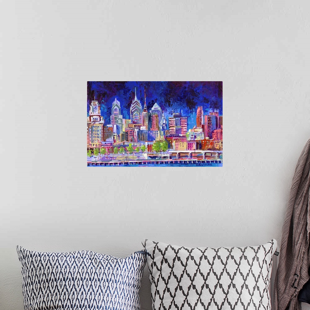 A bohemian room featuring Contemporary painting of the Philadelphia city skyline at night.